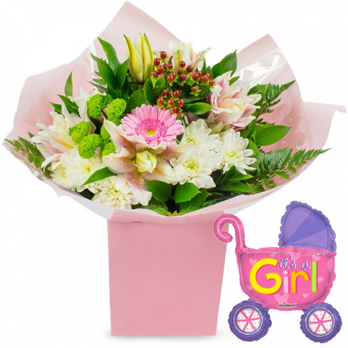 A delightful new baby girl gift set is depicted here, bathed in neutral white studio light so that every soft hue and shiny surface can be clearly imagined. At the centre sits a carefully arranged bouquet, its stems hidden inside a tall, square, light-pink gift box, much like the boxed designs frequently delivered by Brent Cross Flowers to homes surrounding the shopping centre and nearby schools. The flowers are cradled in layers of pale pink tissue paper and wrapped in a smooth covering of clear cellophane, which curls gently at the edges and adds a sense of freshly finished craftsmanship. Rising from this base, the bouquet forms a rounded, abundant shape that feels generous yet balanced. A single bright pink gerbera daisy occupies the central point, its wide, layered petals and neat central disc giving a sense of cheerful focus. Around it, clusters of snow-white chrysanthemums create soft, domed shapes, their many thin petals overlapping like tiny feathers. Woven among these are alstroemeria lilies, their petals a blend of white and light pink with subtle speckling and streaks, adding a sophisticated, almost watercolour detail to the composition. A closed yellow lily bud emerges above the other blooms, a quiet symbol of growth and promise. Pockets of vivid lime-green button flowers are tucked between the paler petals, while clusters of dark red hypericum berries nestle among the foliage, adding depth and visual rhythm. Dark-green leaves and delicate fern fronds spread outward and upward, framing the flowers with a touch of wild greenery. To the right of the box floats a metallic foil balloon in the shape of a baby stroller, its body gleaming in hot pink, with a bold purple hood and purple wheels decorated with colourful spoke patterns. Across the side, playful yellow and green lettering proudly spells out, It's a Girl!, embellished with tiny heart motifs. The complete scene captures the happiness of welcoming a daughter, the kind of arrangement that would feel perfectly at home in a flat overlooking Brent Cross or a family house tucked along the tree-lined streets nearby.