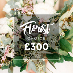 Set against soft morning light, this Florist Choice bouquet from Brent Cross Flowers unfolds with quiet drama. Creamy whites and pale blush tones rise in cloud-like heads-garden roses, peonies, or possibly chrysanthemums-their petals curling with meticulous care and catching the day's first warmth. They are hugged by generous greenery: rounded eucalyptus, olive sprays, and delicate clusters of pale green berries that hint at fresh growth and longevity. White lisianthus or campanula provide delicate contrast, while tiny filler blossoms in light pinks, like waxflower or heather, add a whisper of romance. The arrangement feels both airy and substantial, as if trained by a master stylist who believes balance is a conversation between softness and structure. It's finished with a crisp white frame overlay bearing Florist Choice in a flowing script and CHOICE in bold uppercase type, with ?300 set in bright white. The overall mood is calm, refined, and inviting, suggesting gifts for weddings, anniversaries, or meaningful courtesy gestures. The bouquet is designed for reliable, same-day delivery across Brent Cross, Cricklewood, and nearby NW4 districts, bringing the personal touch of a local florist to doors from Cricklewood Broadway to Golders Green Road and beyond. With Brent Cross Flowers, it's more than a bouquet-it's a crafted moment that speaks of fresh stems, thoughtful selection, and a promise of enduring beauty delivered locally. It resonates with neighbourhood gatherings, whether a milestone meal at a Golders Green flat or a doorstep surprise in Hendon Court, inviting families to pause and share the beauty together.


