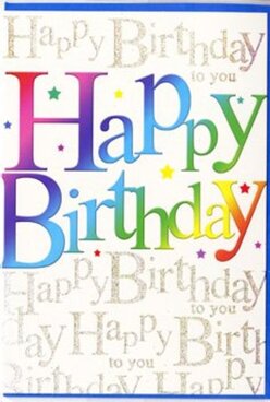 In this image, a joyful birthday card takes centre stage, its design as cheerful as a bright afternoon walking past the shops and cafés near Brent Cross. Across the front, the phrase "Happy Birthday" is displayed in generous, rounded letters that seem to dance slightly as they travel from left to right. Each letter is filled with a smooth, painterly gradient that moves through the colours of the rainbow - beginning with rich crimson and pink, drifting into violet and cobalt, then turning to aqua, emerald, and citrusy yellow. The transitions are soft and blended, evoking the look of airbrushed ink or the way coloured lights gradually change at a party. Behind this confident greeting, the entire background is layered with the repeated line "Happy Birthday to you," written in fine, looping gold script. The script appears slightly shimmering, as though printed with metallic ink that catches the light like the glossy surfaces of the nearby shopping arcade. This golden pattern adds depth and warmth without competing with the main message, instead creating a soft chorus of visual well-wishes, much like a roomful of voices joining in song. Sprinkled around the larger letters are tiny flecks and star-like dots in assorted bright colours, suggesting falling confetti or scattered sugar sprinkles on a celebration cake. The card's finish looks sleek and smooth, with a hint of shine that enhances both the vibrant colours and the glint of gold. Overall, the card feels modern, upbeat, and affectionate - an ideal birthday greeting to slip alongside a bouquet being delivered around Brent Cross, ready to brighten someone's special day from the first glance.