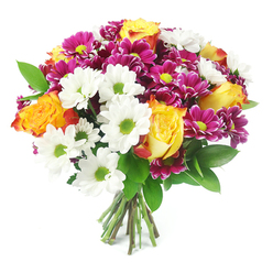 A lush, rounded hand-tied bouquet fills the frame against a spotless white background, every stem carefully positioned to create a feeling of generous abundance. The focal point is a cluster of open roses, each flower a soft flame of colour, with golden yellow centres melting into rich orange and faint red-orange along the petal tips. Surrounding them, snowy white daisy chrysanthemums with neon-lime centres bring a clean, modern brightness, their simple shapes contrasting beautifully with the more complex rose petals. Threaded between these are rich magenta and fuchsia chrysanthemum blooms, small but densely petalled, forming pops of velvety colour that deepen the palette and add a playful energy. Dark, glossy greenery, reminiscent of ruscus, peeks through in measured touches, framing the blossoms and keeping the arrangement from feeling too crowded. The stems are gathered firmly at the base, fanning out slightly where they have been freshly cut, suggesting a bouquet ready to slip into a favourite vase. The white background and soft, even lighting keep the attention firmly on the textures-the satiny rose petals, the crisp daisy rays, and the cushiony chrysanthemum heads. The overall mood is one of joyful sophistication, a bouquet that would look just as at home on a kitchen table off Brent Street as it would in a reception area near Brent Cross Underground. It evokes the feeling of a happy milestone: a birthday, a warm thank-you, or a housewarming gift delivered locally, carrying with it the brightness of a spring garden regardless of the season outside.