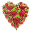 In this photograph, a beautifully crafted heart-shaped funeral arrangement sits against a clear white background, allowing every petal and leaf to be seen in detail. The heart is almost entirely composed of deep red blooms, creating a rich, velvety surface that feels both warm and dignified. Several large red roses, each bloom perfectly formed with layers of smooth, spiralling petals, are spaced evenly across the design, acting as focal points that immediately capture attention. Filling the spaces around them, red carnations and mini carnations form a soft carpet of ruffled texture, their finely frilled petals overlapping in dense clusters so that no gaps or stems are visible. Punctuating this sea of red are bright lime-green button chrysanthemums, their compact, rounded flower heads providing refreshing points of contrast that suggest renewal and gentle hope. Along the outer line of the heart and tucked between some blooms, variegated pittosporum foliage in shades of green and cream subtly frames the shape, while a few slender fern fronds extend from the bottom tip, lending an organic, slightly informal flourish. The arrangement feels thoughtfully composed, reflecting the quiet care typical of local Brent Cross florists when preparing tributes for services at nearby churches, crematoria, or cemeteries. Its combination of classic romantic red and invigorating green makes it suitable for expressing both deep sorrow and enduring love, whether from an immediate family member or close friend. The piece visually communicates what many in Brent Cross feel at such times: a heartfelt farewell, filled with gratitude and cherished memories.